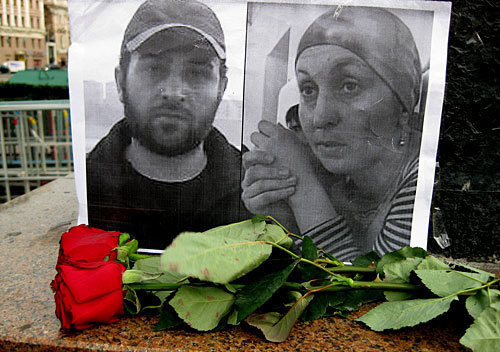 Portraits of Zarema Sadulaeva and Alik Jabrailov, attached to the street lamp on Pushkinskaya square in Moscow. Photo of "Caucasian Knot"