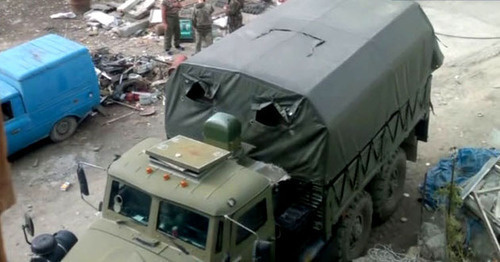 At the place of the special operation in the settlement of Vremenny. The Untsukul District of Dagestan, September 2014. Screenshot of a video by the "Caucasian Knot"