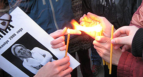 At the action in memory of the murdered journalist Anna Politkovskaya. Photo from the "Caucasian Knot" archive, October 2009