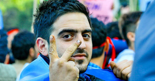 A participant of the oppositional rally. Baku, October 12, 2013. Photo by Aziz Karimov for the "Caucasian Knot"