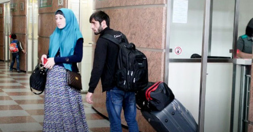 Chechen refugees pass through border control in Brest. Photo: Oksana Brovach, http://kavpolit.com