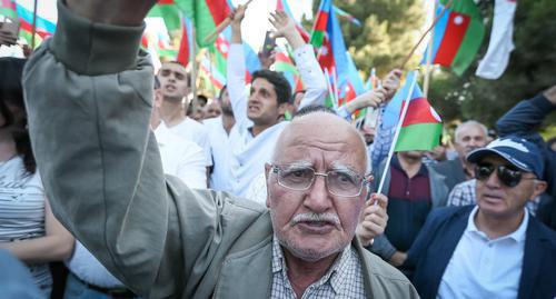 A participant of the action on the anniversary of Azerbaijan Democratic Republic. Photo by Aziz Karimov for the "Caucasian Knot"