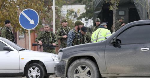 Law enforcers. Photo: REUTERS/Alkhan Gargayev