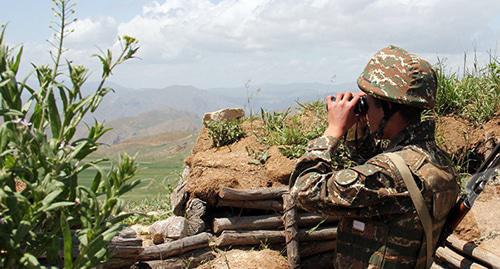 Soldier of the Nagorno-Karabakh army. Photo © Sputnik/ David Galstyan http://ru.armeniasputnik.am/karabah/20160808/4596435.html