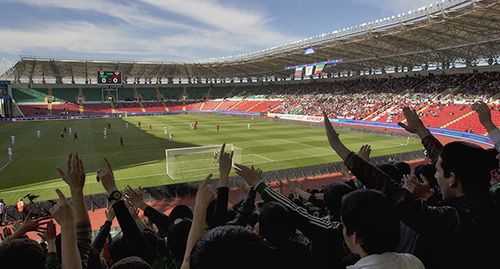 Football fans at the match of the "Akhmat" FC at the "Akhmat Arena". Photo: REUTERS/Maxim Shemetov