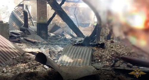 A school that was burned down in the village of Surkh-Digora. Screenshot: video by the Ministry of Interior for North Ossetia, https://15.мвд.рф/news/window/20144735/