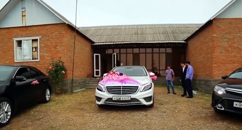 A wedding cortege in Chechnya. Screenshot of the video https://www.youtube.com/watch?v=EU8rWT-FgPQ