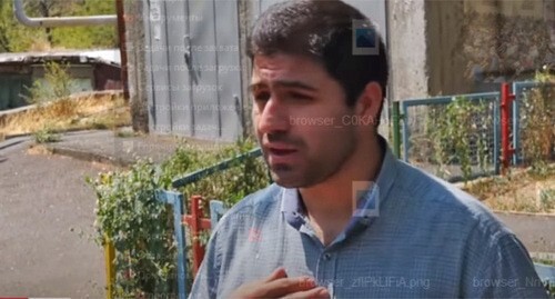 A resident of a multi-storey building in Yerevan. Screenshot of the video https://www.youtube.com/watch?v=_9Fq__7J8Cg