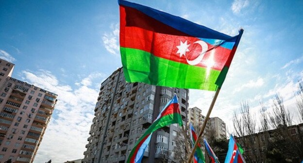 The flag of Azerbaijan at a protest action. Photo by Aziz Karimov for the "Caucasian Knot"