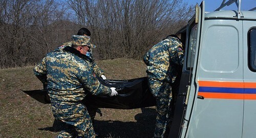 A search party with remains of a military serviceman. Photo from the page on Facebook https://www.facebook.com/photo/?fbid=253137966832379&amp;set=a.204085831737593