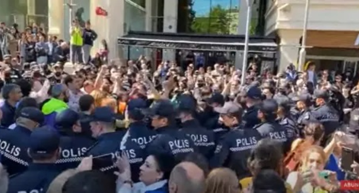 Clashes with policemen at a protest action in Baku. Image made from video posted by Meydan TV on May 14, 2022, https://www.youtube.com/watch?v=v5w2VgDymLU