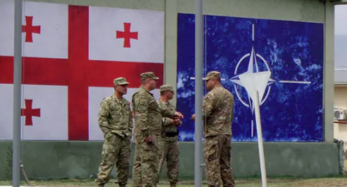 Flags of Georgia and NATO. Photo by Inna Kukudzhanova for the Cauacasian Knot