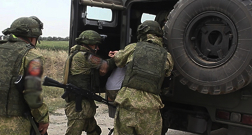 Law enforcers detain a suspect. Photo: https://function.mil.ru