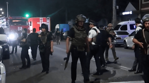 Law enforcers at the site of the militants' attack. Makhachkala, June 23, 2024. Screenshot of a video by RBC https://www.rbc.ru/politics/23/06/2024/6678605c9a79473e6ab810cd