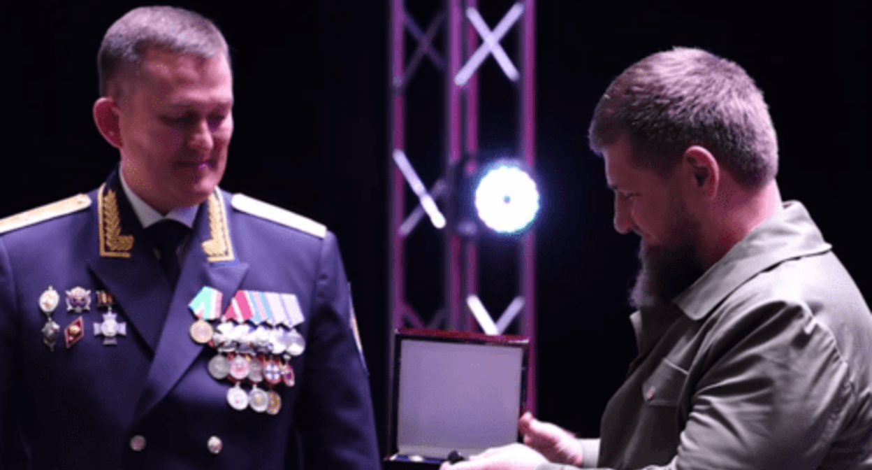 Ramzan Kadyrov receives an award from Dmitry Kechkin (left). Screenshot of a video posted on Kadyrov's Telegram channel on October 19, 2024 https://t.me/RKadyrov_95/5181