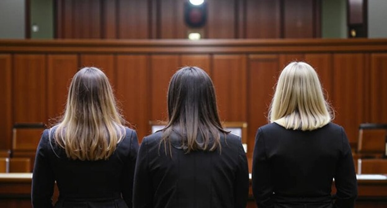 Women standing in a court. Picture generated in Copilot by the "Caucasian Knot"