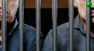 Convicts behind bars: illustration created by the "Caucasian Knot" by using the AI in Photoshop 