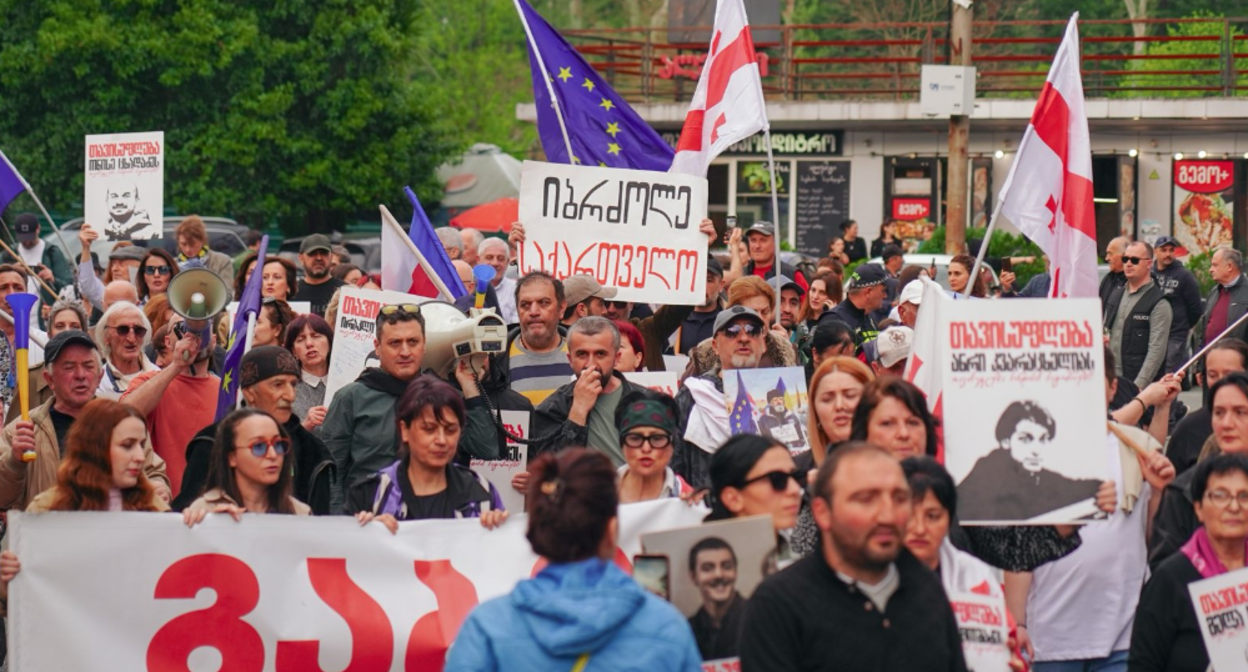 Protesters in Zugdidi. Screenshot of a photo by Mo Se from April 26, 2026, https://www.facebook.com/photo?fbid=4290374601277279&set=pcb.4290374881277251. Protesters in Zugdidi. Screenshot of a photo by Mo Se from April 26, 2026, https://www.facebook.com/photo?fbid=4290374601277279&set=pcb.4290374881277251.